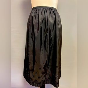 Vintage slip/skirt lingerie style. No tag, size 6/8, elastic waist.